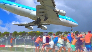 St Maarten unforgettable unique attraction KLM B747 low landing and amazing Jet Blast at Maho beach [upl. by Ennairod286]